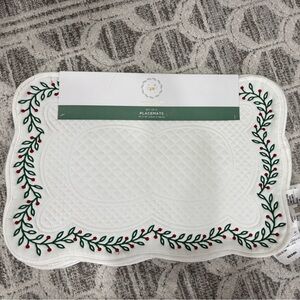 White Quilted Placemat with Red and Green Embroidery
